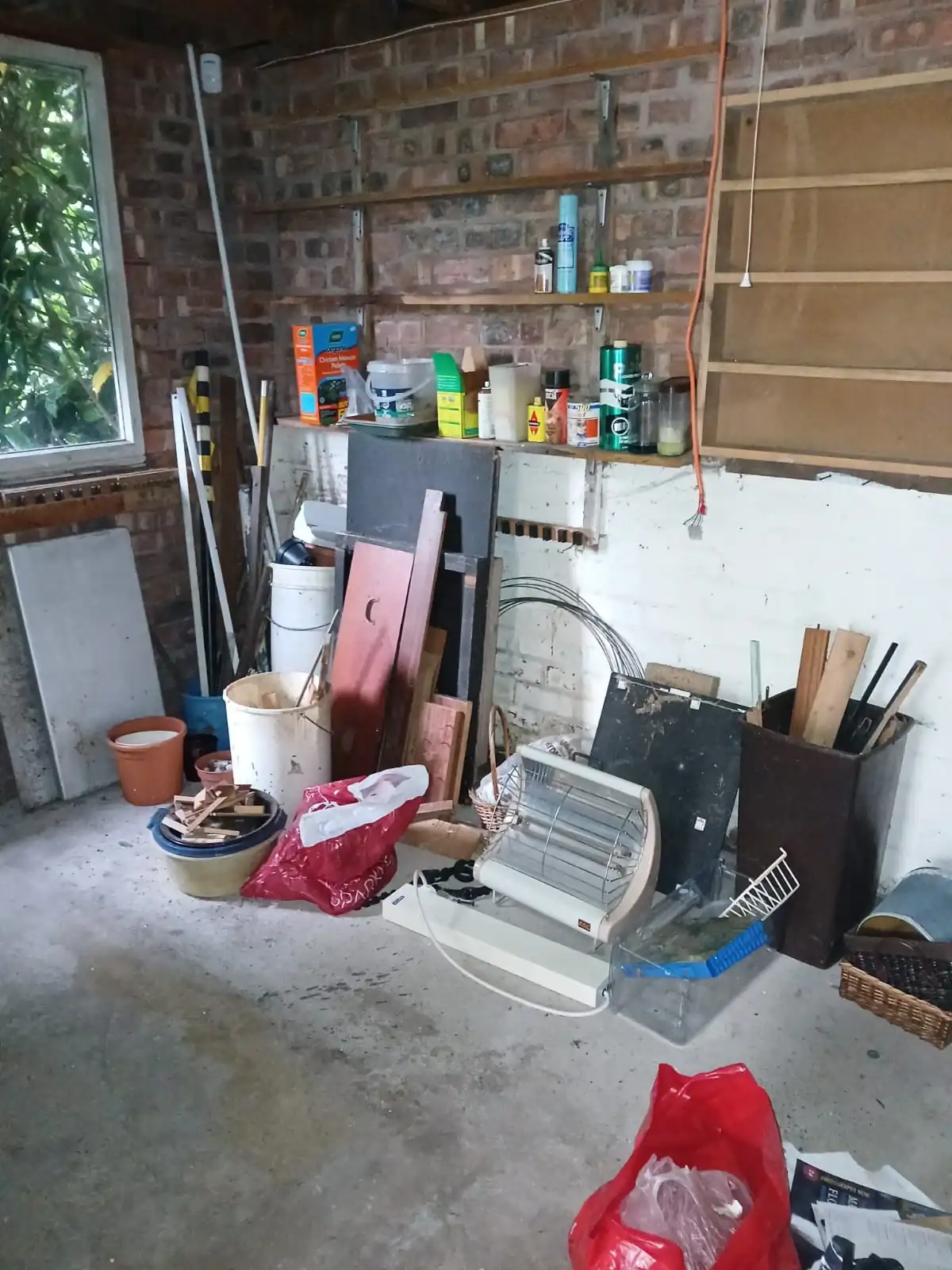 Uniformed team loading waste into van in the North West