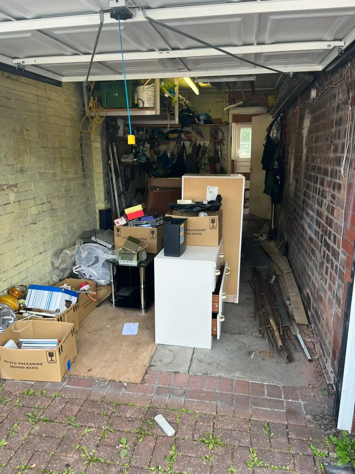 Garage Clearance in Leigh - uniformed team with van