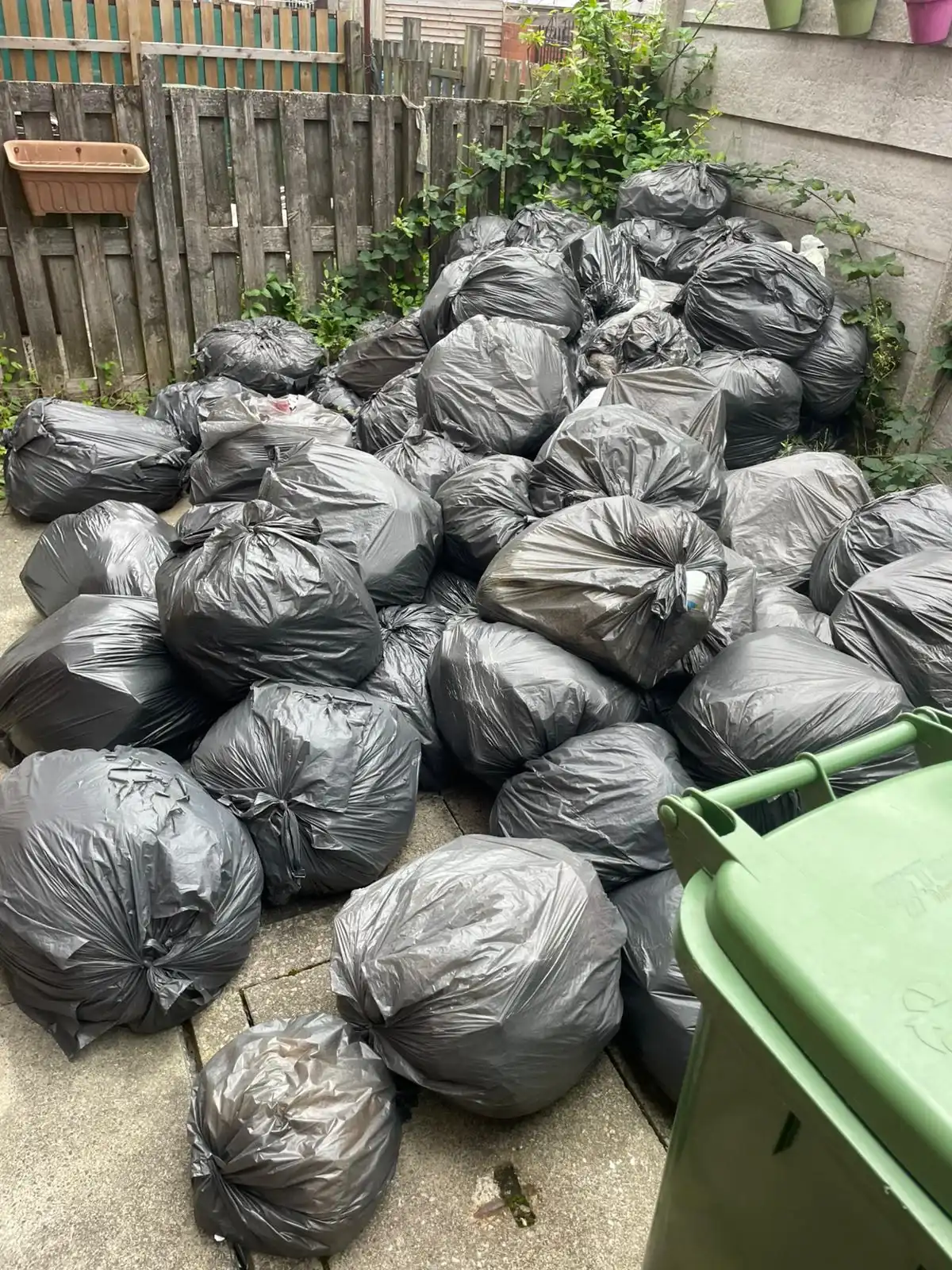 Garden Waste Removal in Salford Quays - uniformed team with van