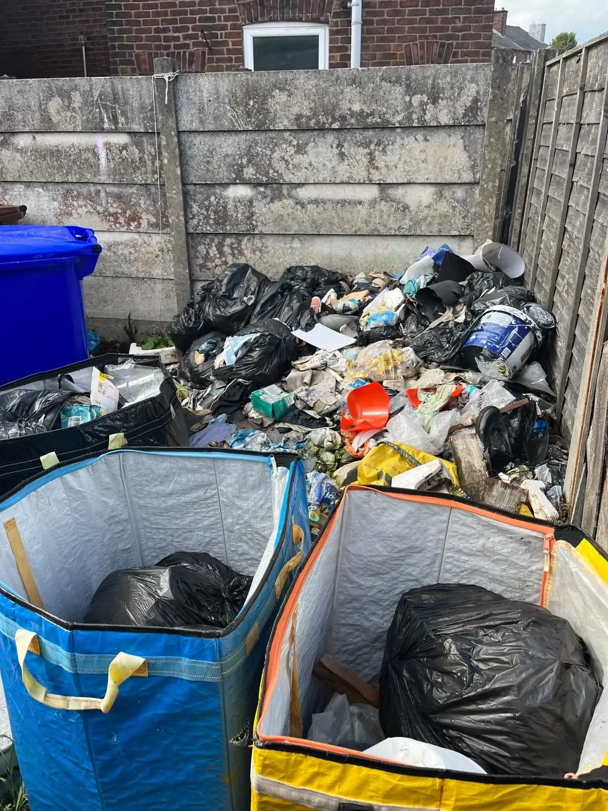 Rubbish Removal in Holmes Chapel - uniformed team with van