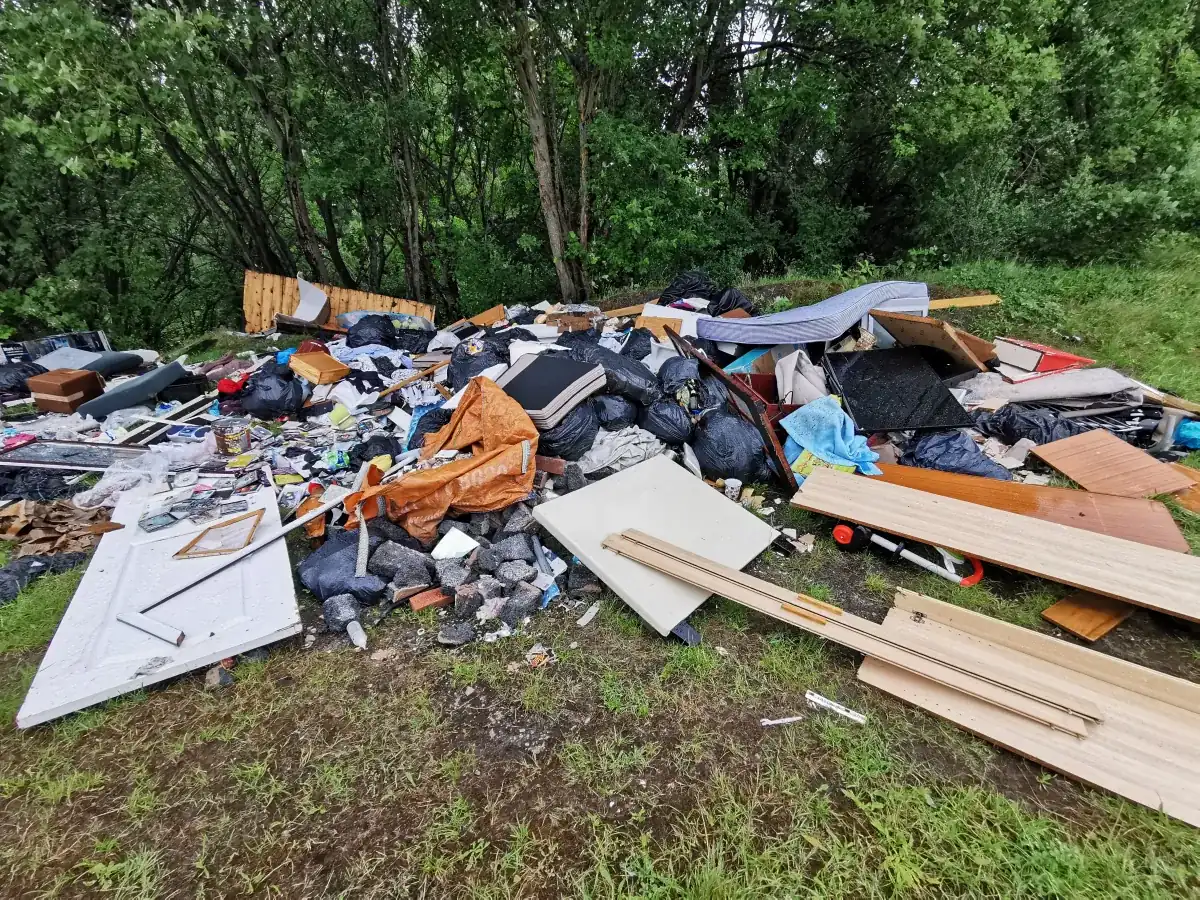 Uniformed team loading waste into van in the North West