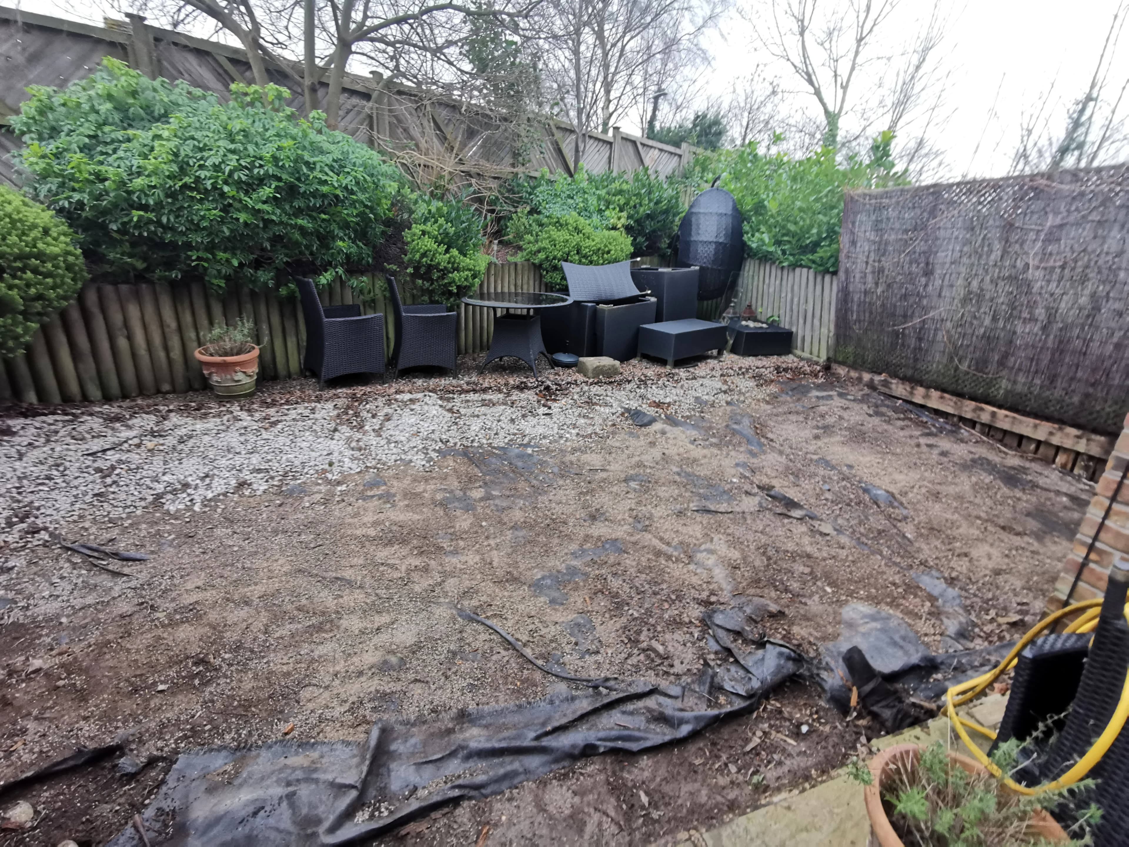 After Garden Waste Removal - completed clearance showing clean space